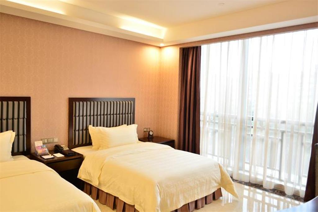 Aimoer Hotel Foshan Oda fotoğraf